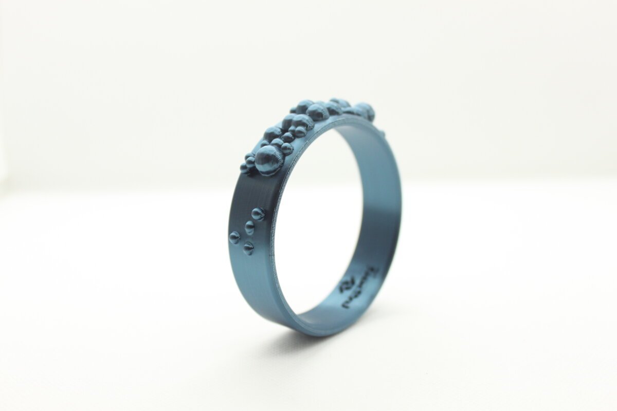 pulsera impresa en 3D color cian