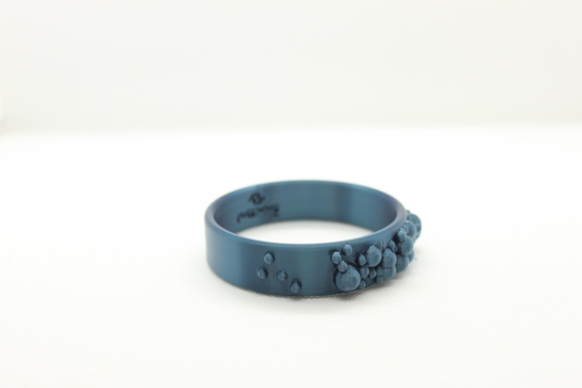 pulsera impresa en 3D color cian